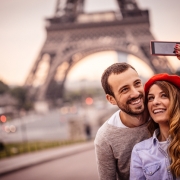 Selfie in front of the Eiffel Tower Europe Travel Guide Tips